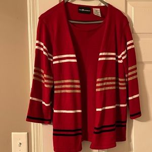Sweater with attached cardigan. This item has only been worn once.